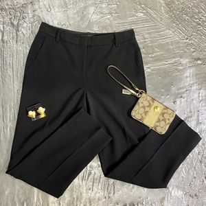 BCBG black dress pants/ Coach wristlet / Gold pearl earrings